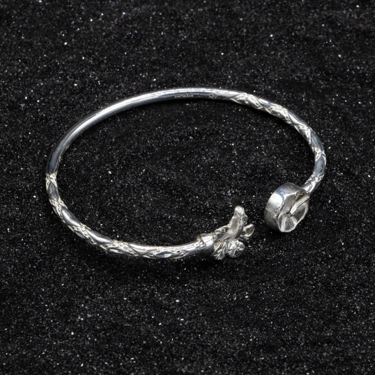 Light Hibiscus Flower and Steel Pan Bangle with Diamante Pattern